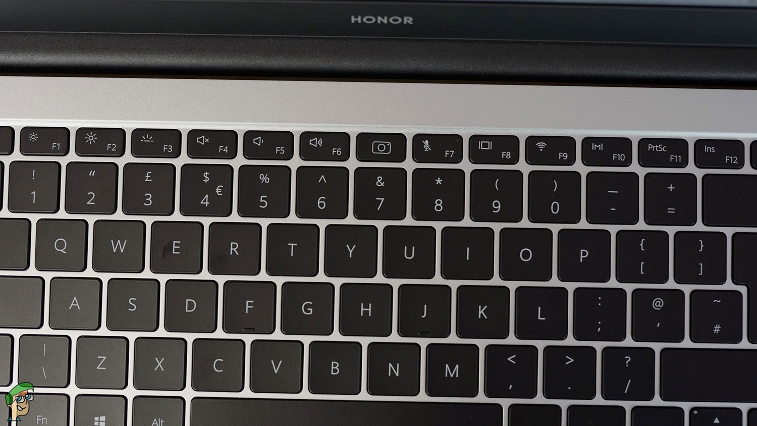 The hidden camera sandwiched between the F6 and F7 key.